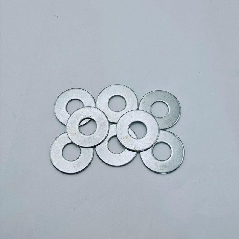 Compre Arruela Lisa 3/8 Zincada de aço carbono. Ideal para distribuição de carga e proteção de superfícies. Garanta a fixação segura dos seus projetos!